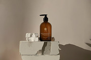 Amber Dispenser Bottle Mockup Bundle, a Packaging Mockup by Wildfield Studio (Thumbnail 10 of 17)