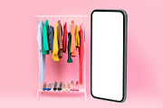 Huge Mobile Phone Screen Standing Near Clothing Rack, Pink Background, a Photo by Prostock-Studio (Thumbnail 4 of 4)