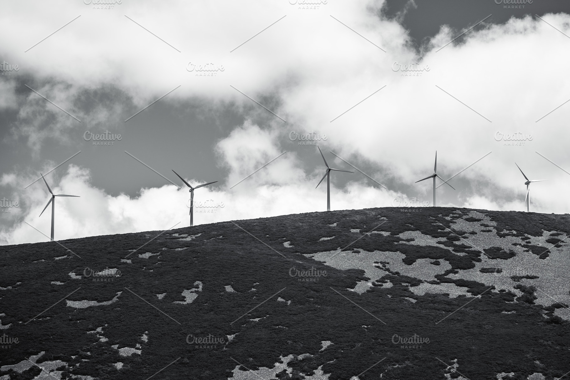 Wind turbines on hilltop, an Industrial Photo by SkyNext
