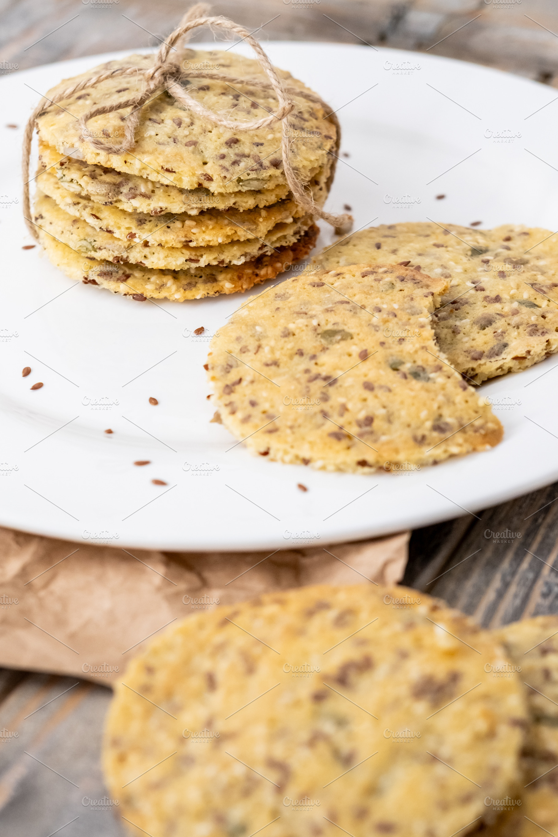 Rustic treat tasty cookies biscuits seeds plate, a Food & Drink Photo by Photo Drive Studio