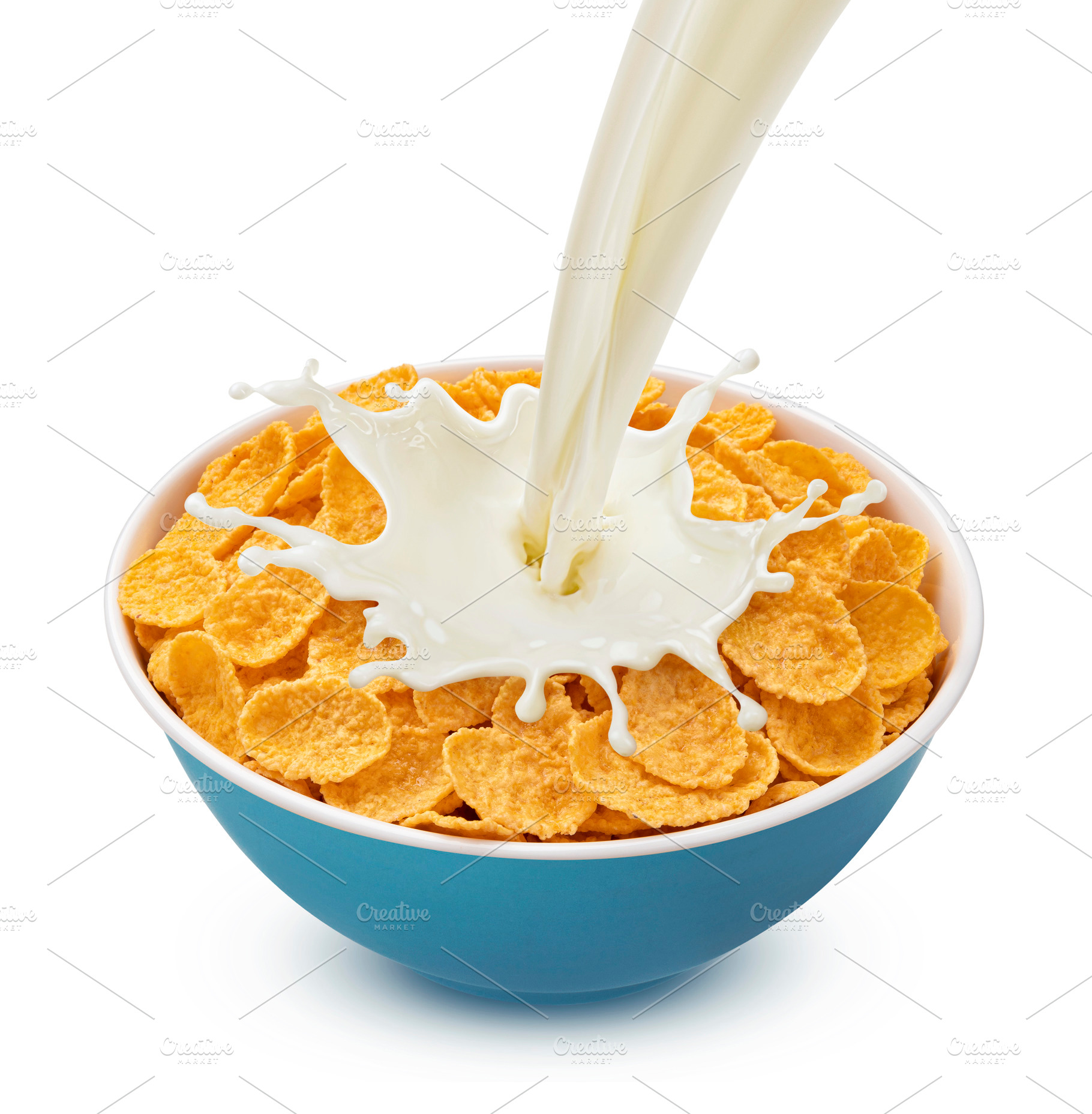 Corn flakes with pouring milk, a Food & Drink Photo by Max Lashcheuski