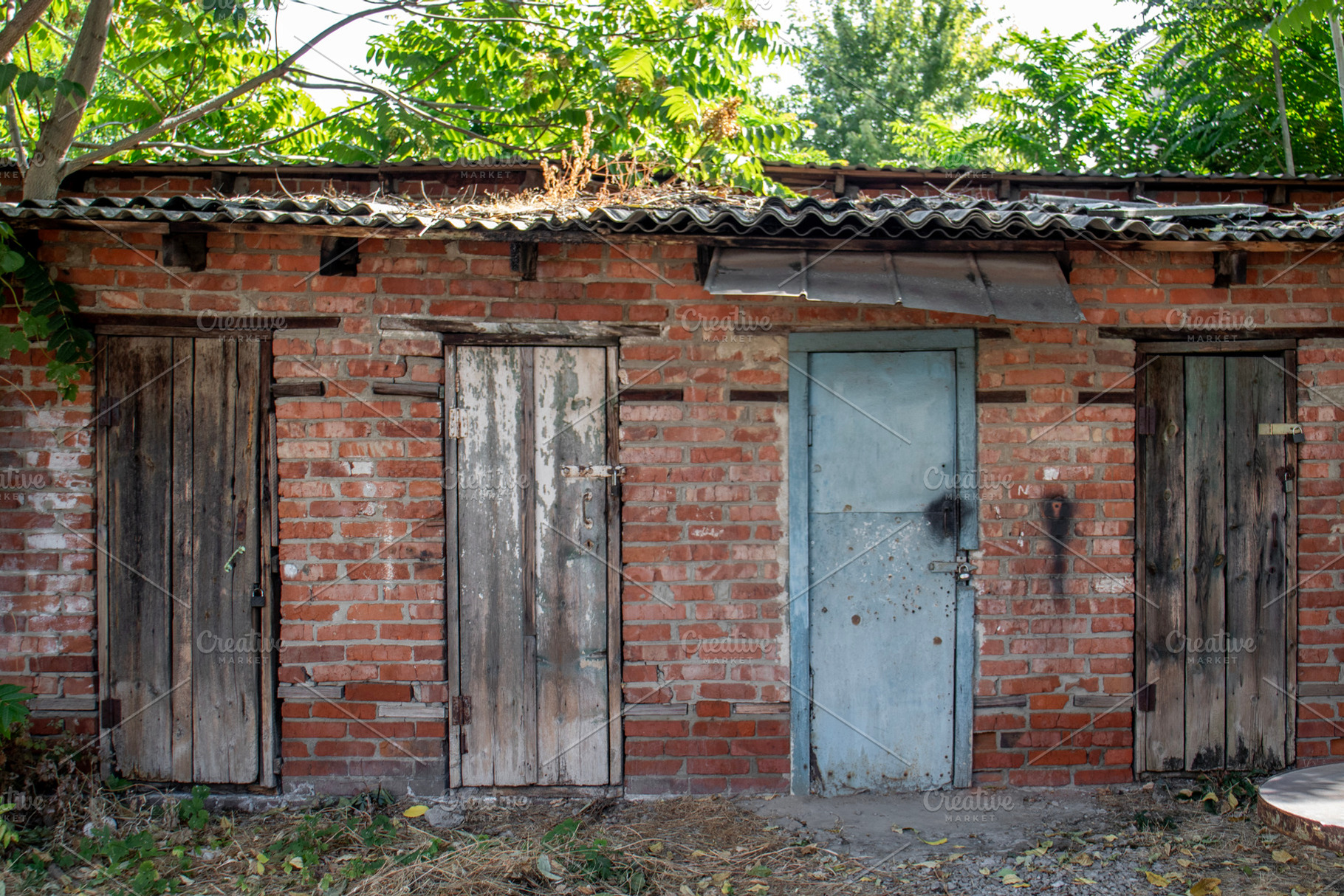 Four doors on wall of storage shed, an Architecture Photo by Schreibikus
