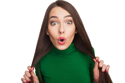 Woman in a green turtleneck containing color, green, and turtleneck