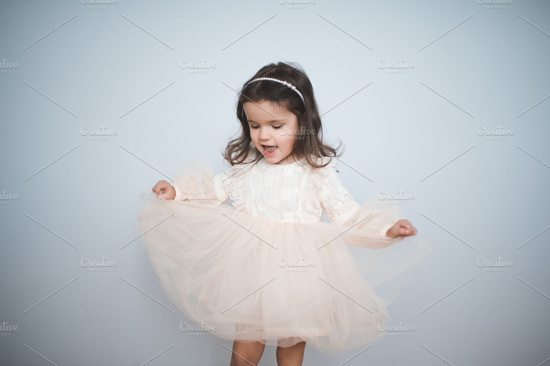 Cute kid girl wearing princess dress, a Person Photo by morrowlight
