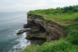 Stunning cliffside coastline at Tana, a Photo by Iftikhar Alam