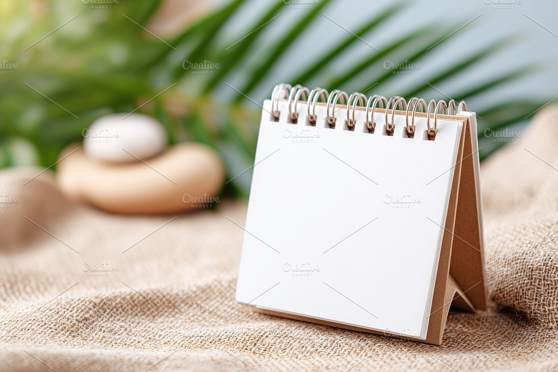 Blank calendar stand with empty pages for planning and organization ready for n, a Photo by AlyaAnd