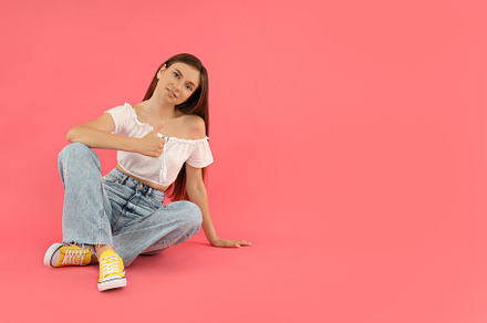 Concept of people, young woman on pink background, a Person Photo by AtlasStudio PRO
