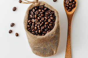 Roasted Coffee Beans in Burlap Sack, a Food & Drink Photo by Pixeness Studio
