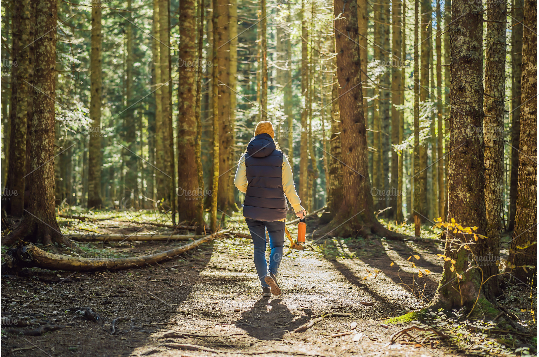 A woman in warm clothes enjoys a, a Nature Photo by Elizaveta Galitskaya