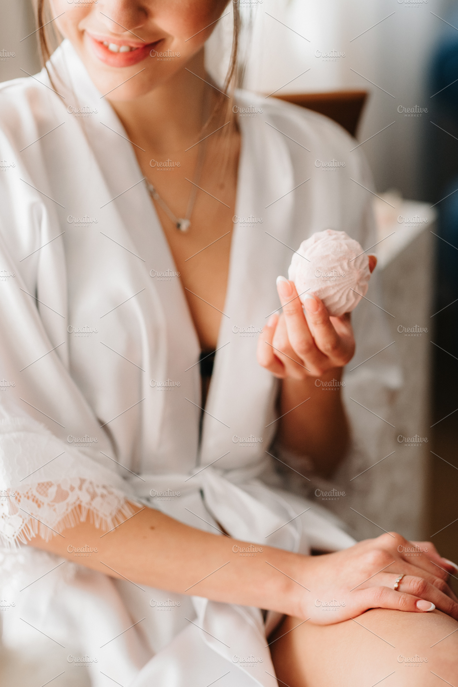 A young bride sits at a slot machine in the morning and drinks c, a Person Photo by Weddings, People, Travel