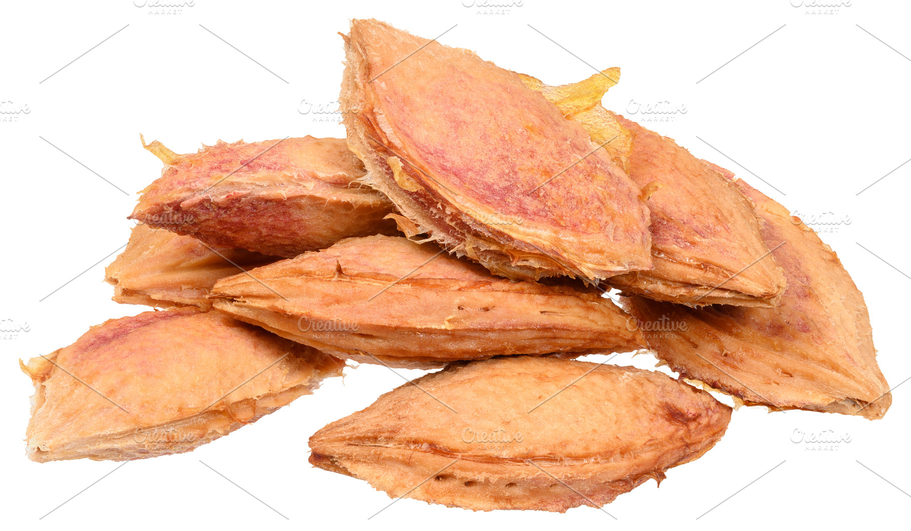 A small pile of dried plum pits with a fibrous texture and detai, a Food & Drink Photo by ndanko