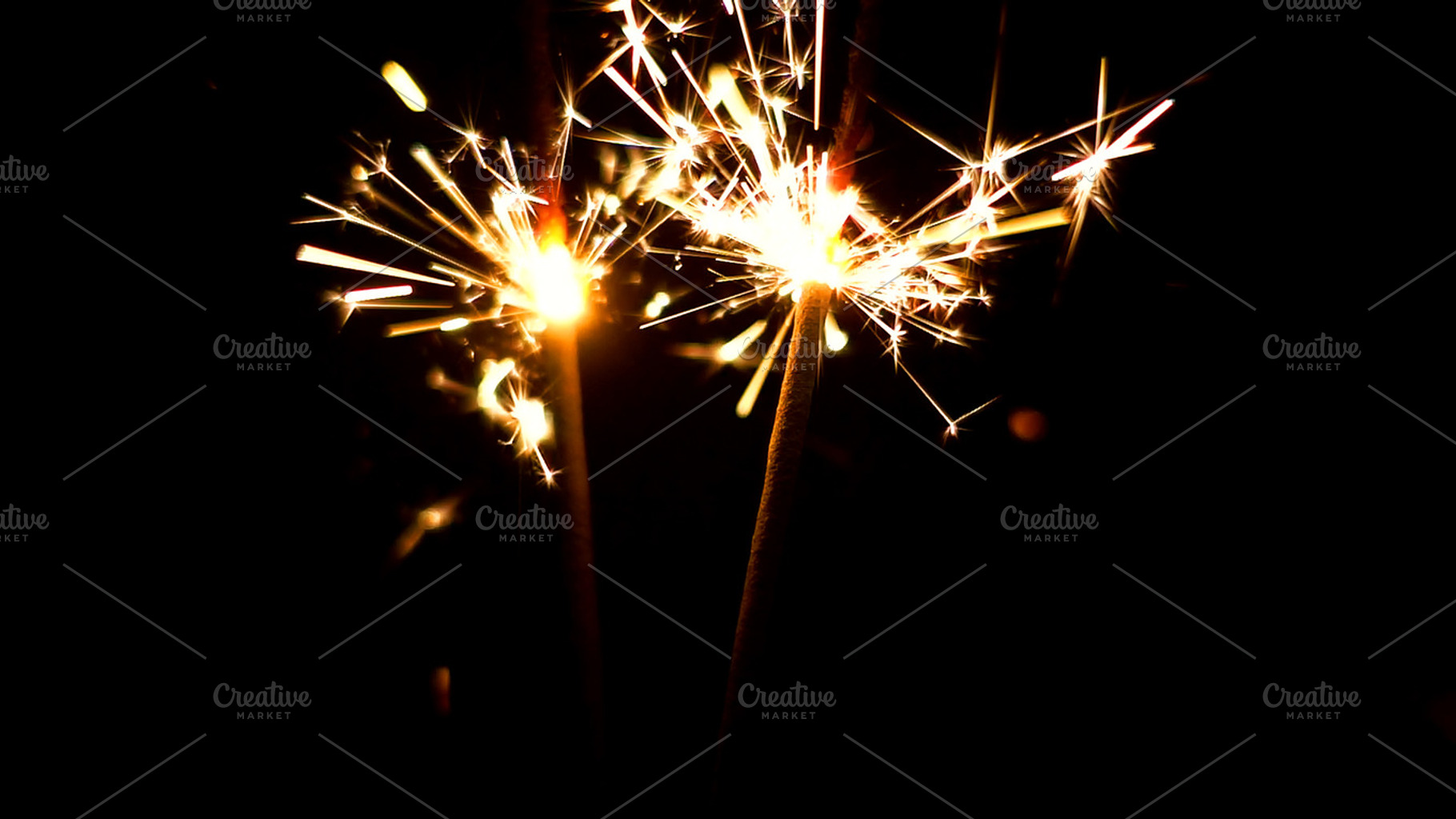 Burning Sparklers. Christmas lights., a Background Photo by HighRes Pictures
