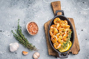 Ready-to-eat pan-seared shrimp (prawns) with fresh herbs, positi, a Food & Drink Photo by composter-box@mail.ru