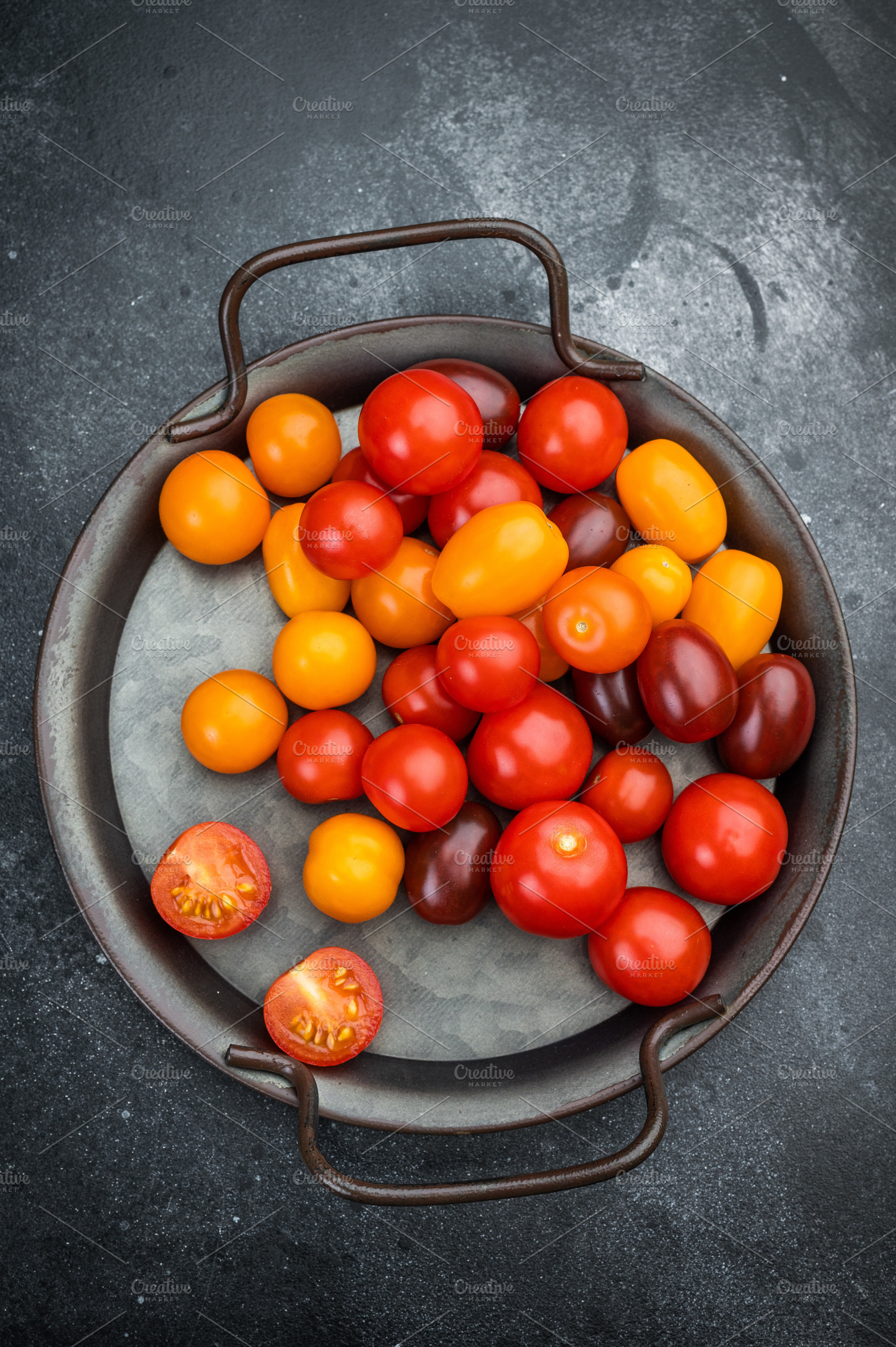 Colorful mix of cherry tomatoes in red yellow and orange tones a, a Food & Drink Photo by composter-box@mail.ru