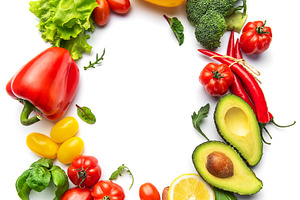 Fresh organic vegetables forming a circular frame, a Food & Drink Photo by Olena Rudo