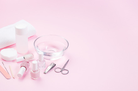 Spa set equipment for manicure or pedicure with nail coat or polish, on pink ba, a Beauty & Fashion Photo by iuliia_n