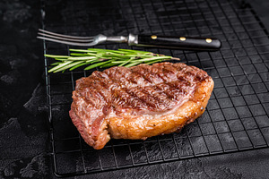 Juicy grilled striploin New York steak with perfect grill marks,, a Food & Drink Photo by composter-box@mail.ru