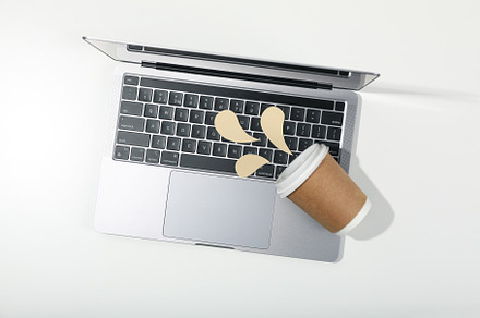 Concept of spilled drink, paper cup and decorative liquid on lap, a Business Photo by AtlasStudio