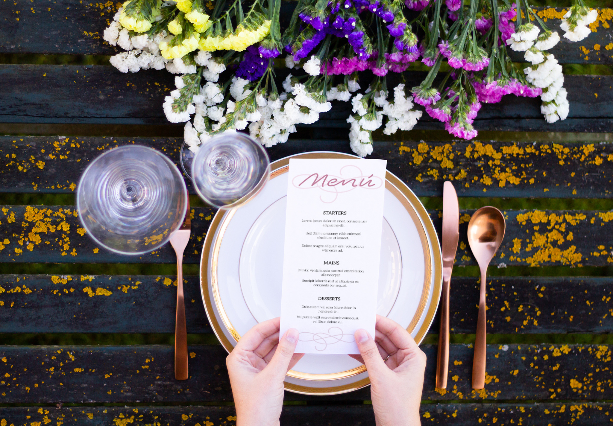 Top view Hands Holding a Menu Mockup, a Print Template by McLittle Stock