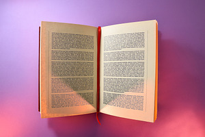Open book written with log tape isolated with purple background, an Arts & Entertainment Photo by Davizro's Market