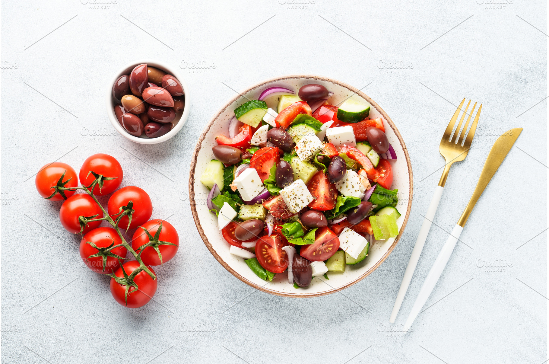 Greek salad in craft plate on white, a Food & Drink Photo by Nadia-nb