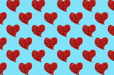 Seamless pattern with hearts and confetti. Vibrant festive desig, a Background Photo by vimart