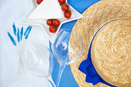cheese, tomatoes, glasses, hat on blue tablecloth, a Food & Drink Photo by Artsaba Family
