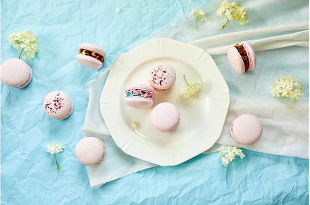 Assorted sweet french pink macarons, a Food & Drink Photo by IlliaBondarPhotography