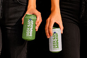 Two Hands Holding Beer Cans Mockup, a Cups & Container Mockup by The Rose Project (Thumbnail 1 of 3)