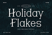 Holiday Flakes - Christmas Font, a Serif Font by Viswal Studio (Thumbnail 1 of 6)
