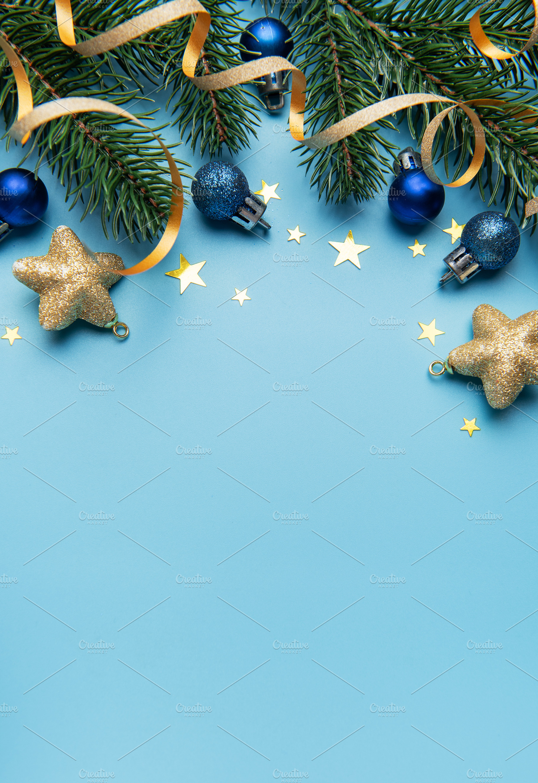 Christmas holiday border design with blue ornaments and stars, a Holiday Photo by Olena Rudo