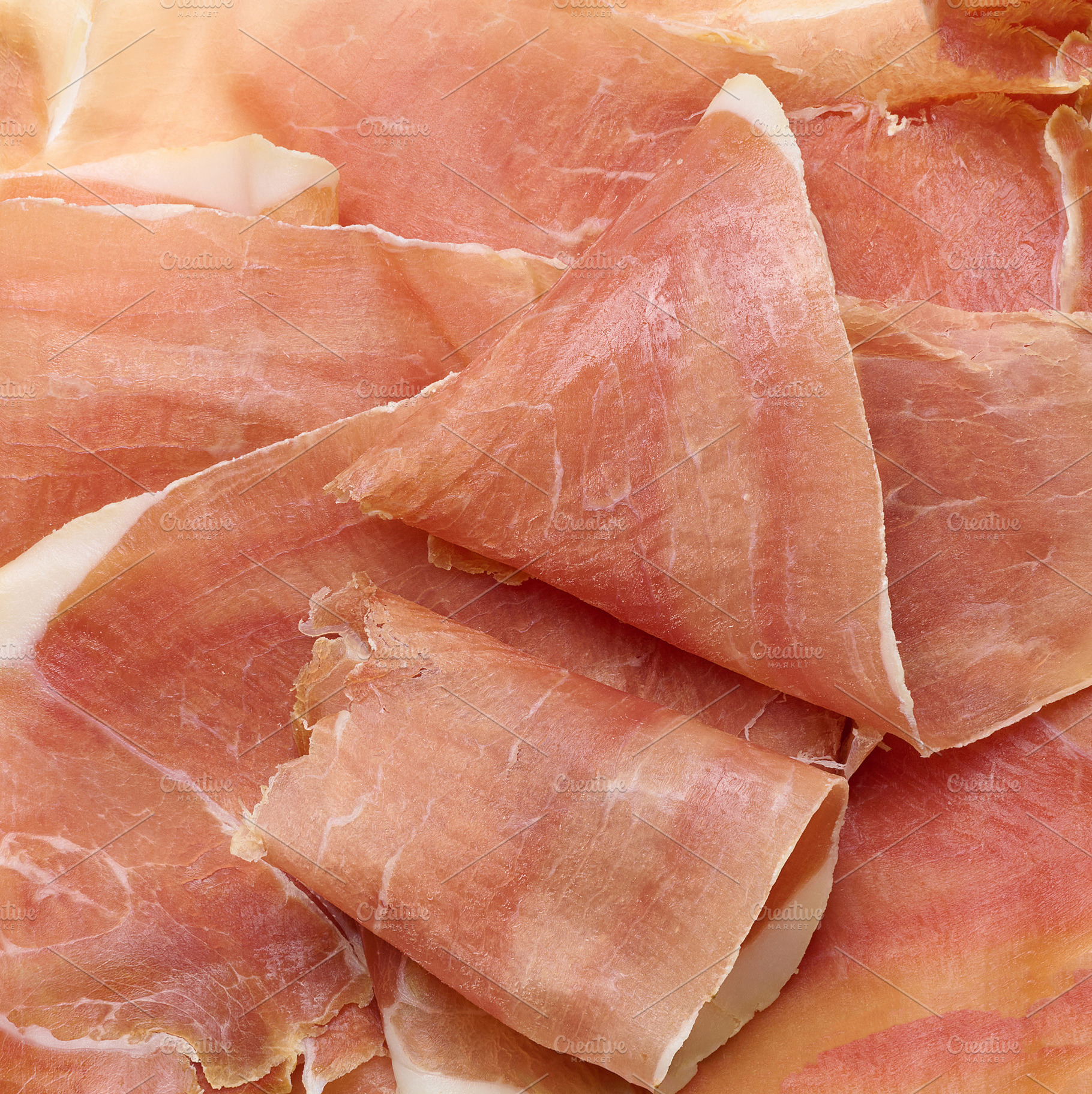 Thinly sliced dry-cured jamon or prosciutto ham., a Food & Drink Photo by ndanko