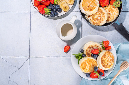 Cottage cheese pancakes, syrniki, a Food & Drink Photo by Rimma