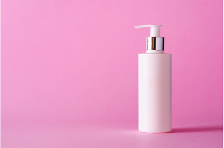 White bottle of moisturizing lotion, a Beauty & Fashion Photo by Enjoy Photo