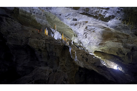 Inside lighted cave. Action. Amazing, a Nature Photo by Media Whale Stock