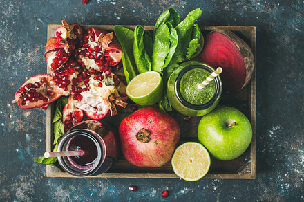 Fresh juices or smoothies with fruit featuring pomegranate, fruit, and ripe, a Food & Drink Photo by Foxys