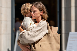 Mother and child embracing in a warm moment, a Person Photo by AlyaAnd
