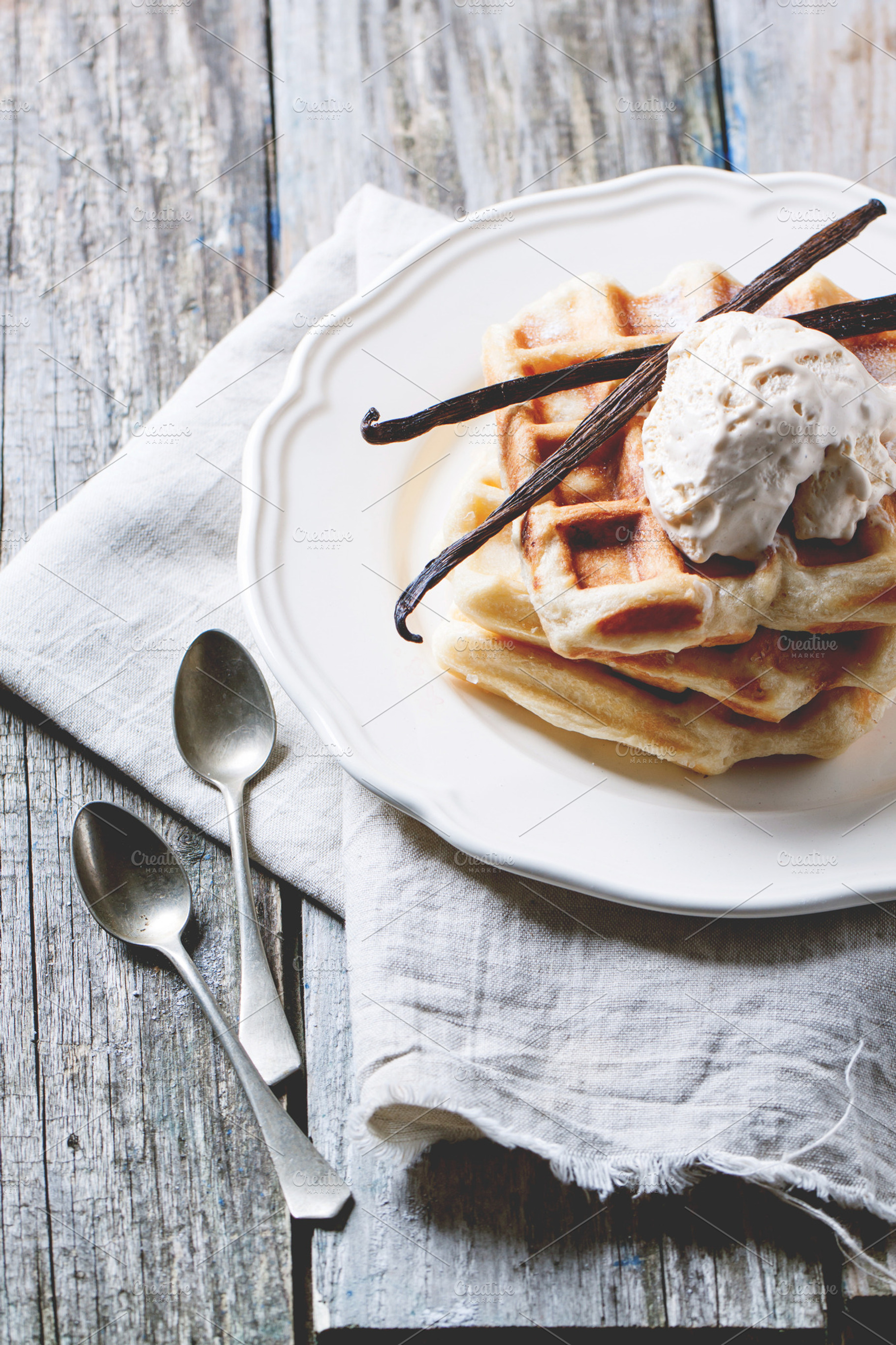 Waffles with vanilla and ice cream containing waffles, waffle, and sweet