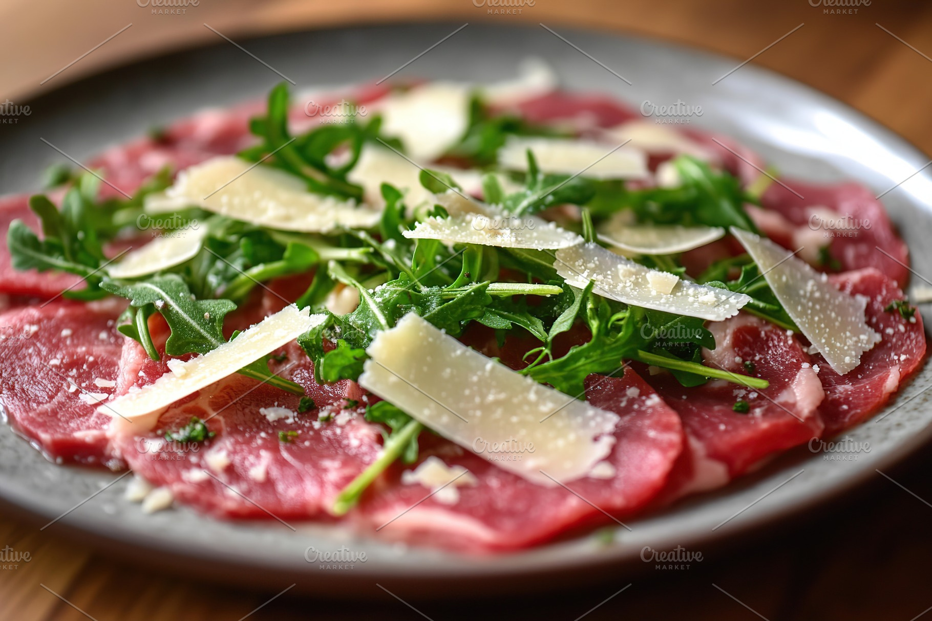 Delightful beef carpaccio topped with fresh arugula and parmesan shavings serve, a Food & Drink Photo by AlyaAnd