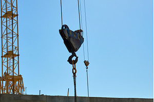 A construction crane stands tall at, an Industrial Photo by darksoul72