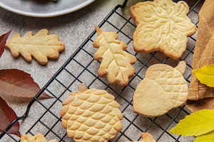 Homemade autumn cookies baking on cooling rack, a Food & Drink Photo by Olena Rudo