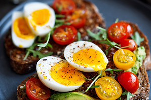 Healthy breakfast toast with eggs, a Food & Drink Photo by MistyDay