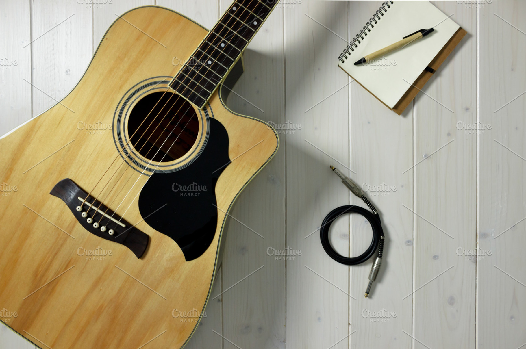 Acoustic guitar on wood top & cable featuring guitar, acoustic guitar, and, an Arts & Entertainment Photo by NikoKolev