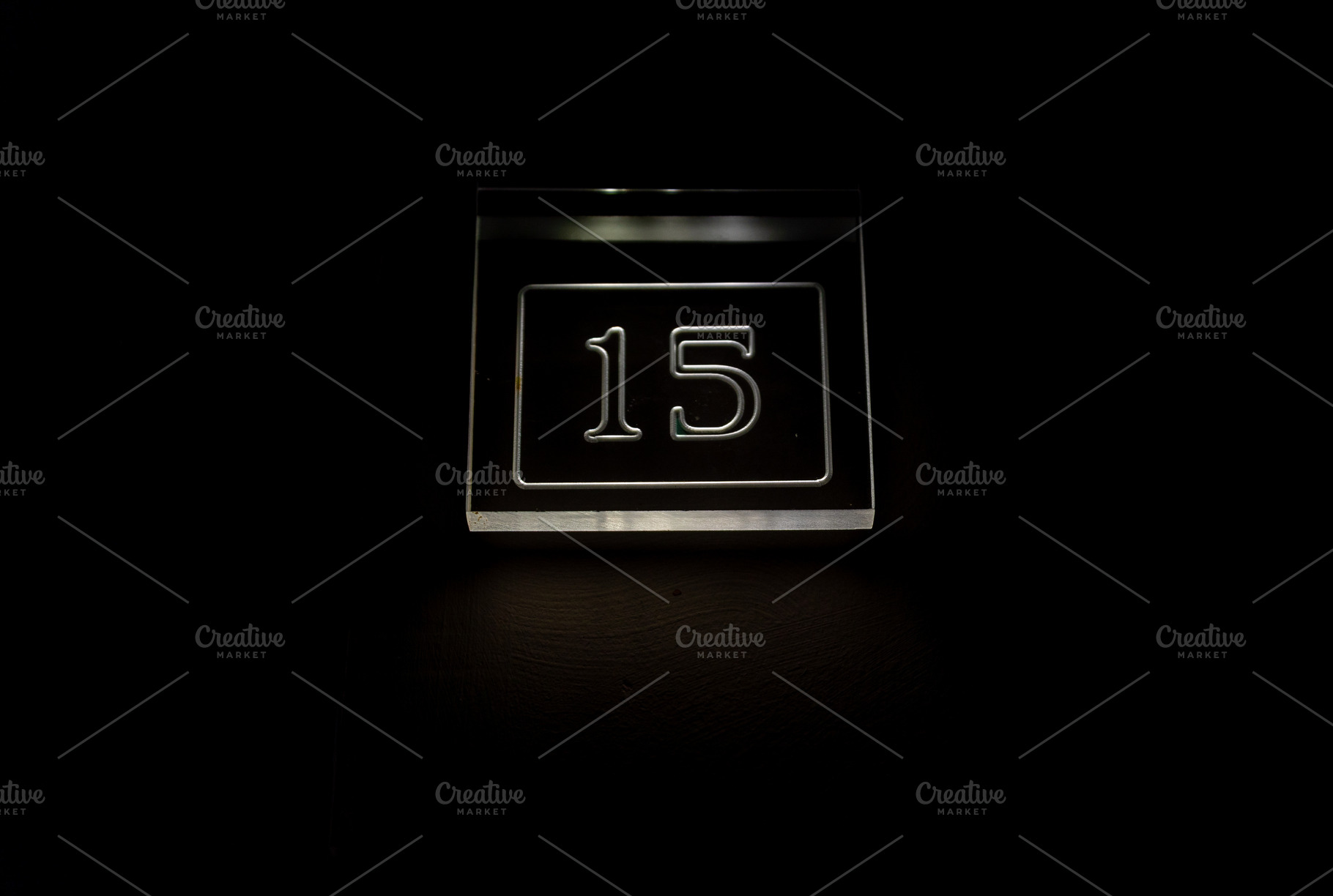 Glowing number 15 sign on a dark background, modern minimal design, perfect for, a Background Photo by Ales Munt