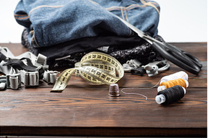 Metal thimble with sewing tools and, an Industrial Photo by Stockphoto by vzwer