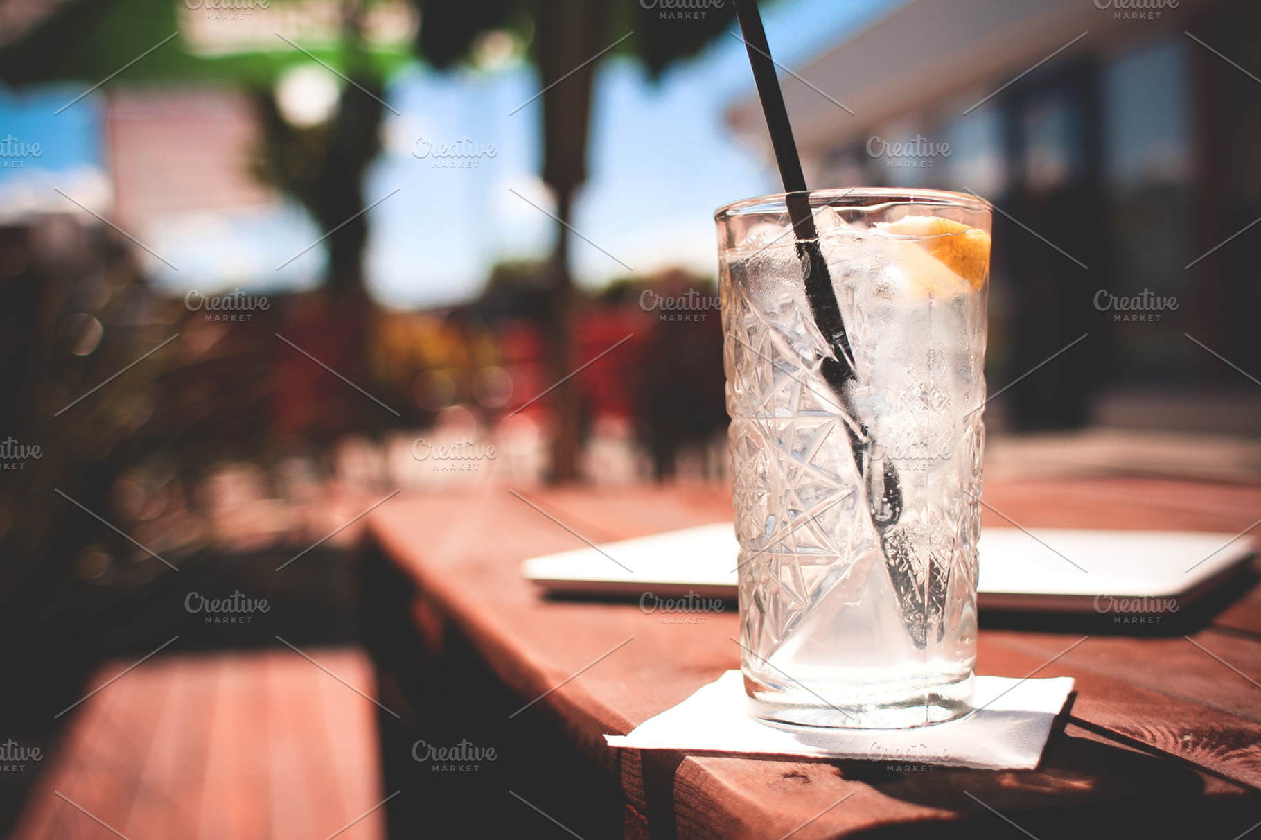 Fresh Cocktail With Closed Macbook