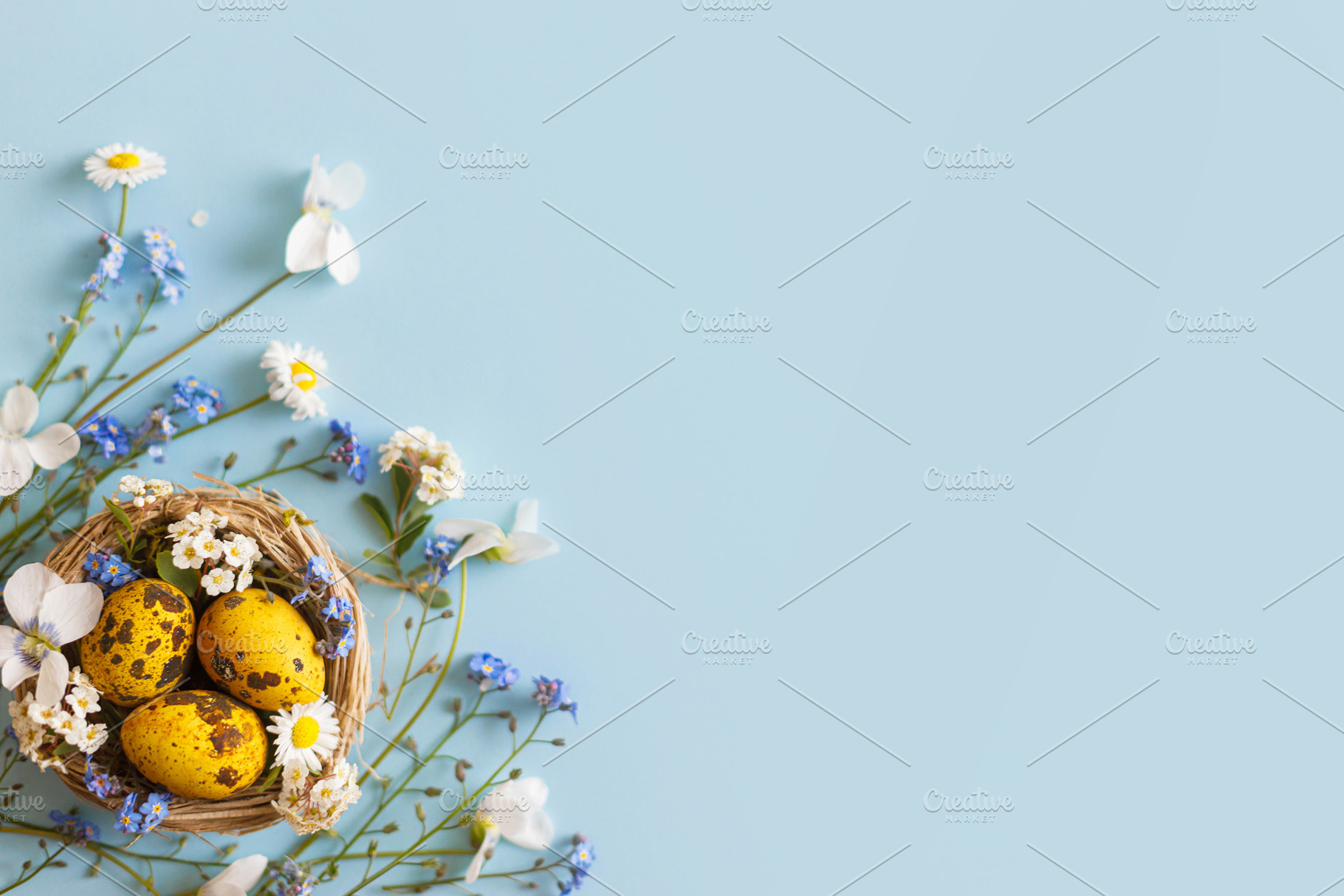 Easter flat lay. Stylish easter eggs and spring flowers in nest, a Holiday Photo by Sonjachni