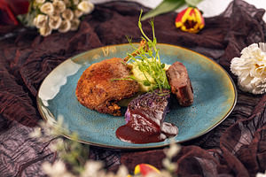 Roasted duck confit with mashed potatoes, a Photo by Grafvision photography