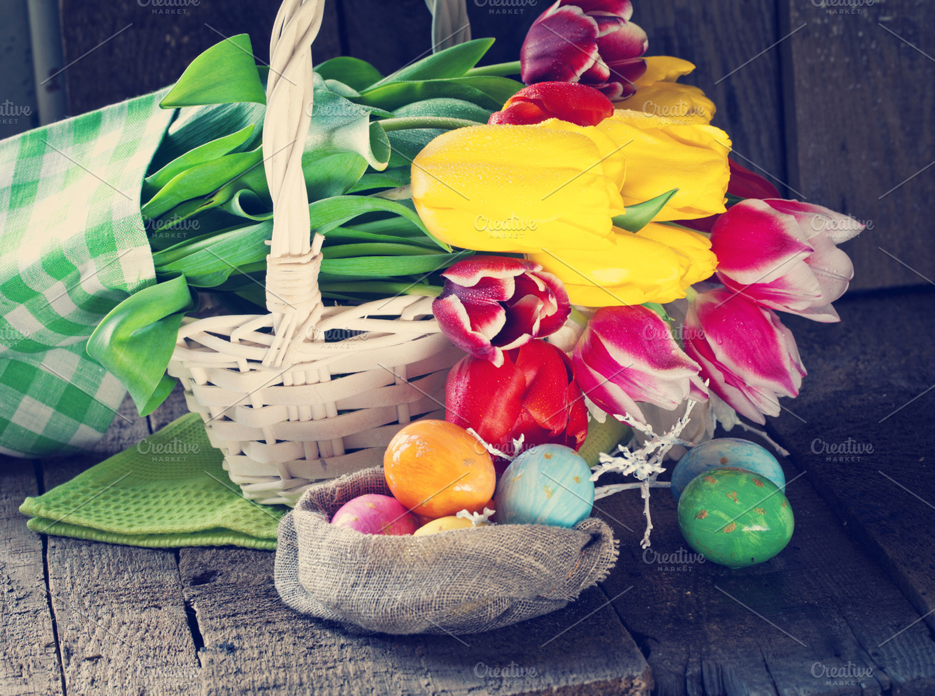 Tulip flowers in wooden background stock photo, a Holiday Photo by eleana