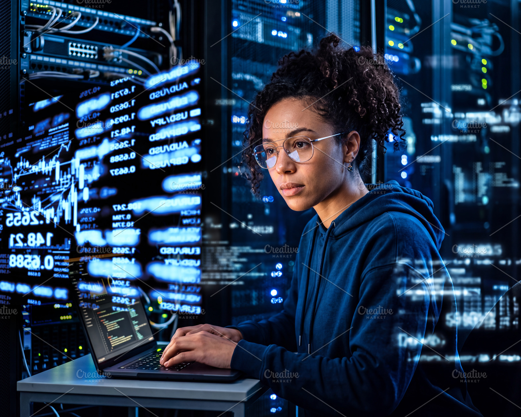 Young mixed race female (mulatto) IT specialist working on lapto, a Technology Photo by Volff